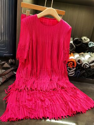 Women's High-End Casual Two-Piece Short-Sleeved Tops and Pleated Tassel Skirts Solid Pattern New Summer Fashion Suit