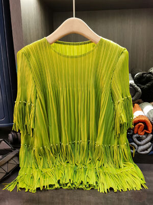 Women's High-End Casual Two-Piece Short-Sleeved Tops and Pleated Tassel Skirts Solid Pattern New Summer Fashion Suit