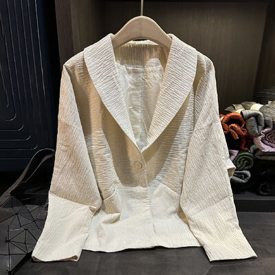 Elegant temperament, high-end design sense, spliced solid color lapel jacket, autumn and winter pleated Cota