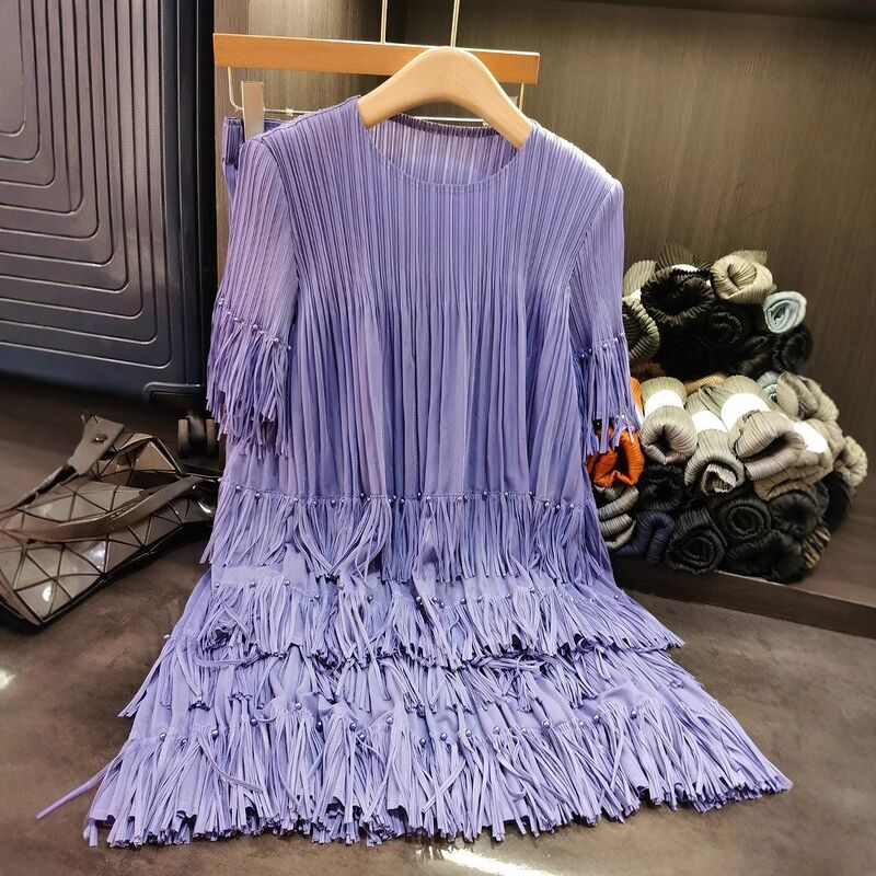 Women's High-End Casual Two-Piece Short-Sleeved Tops and Pleated Tassel Skirts Solid Pattern New Summer Fashion Suit